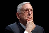 In an April 26, 2018, file photo, Defense Secretary Jim Mattis listens to a question during a h ...