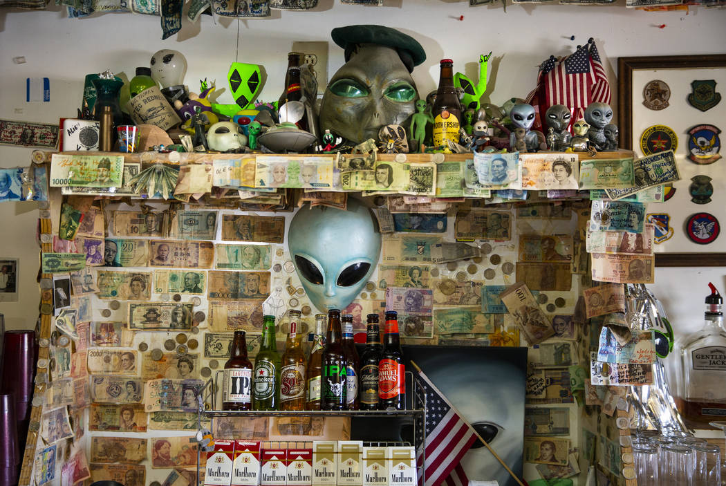 Alien memorabilia behind the bar and the restaurant at the Little A'Le'Inn in Rachel, which wil ...