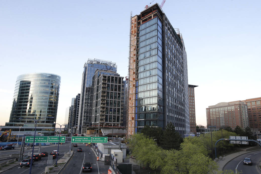 In this Wednesday, May 8, 2019 photo, new buildings form part of the skyline in Boston's Seapor ...