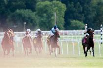 Julio Garcia, from right, riding Bound for Nowhere, and James Graham, riding Great Wide Open, l ...