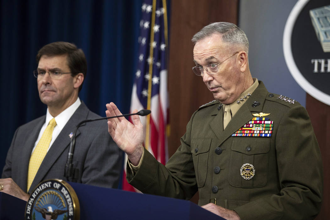 Joint Chiefs Chairman Gen. Joseph Dunford with Secretary of Defense Mark Esper speaks to report ...