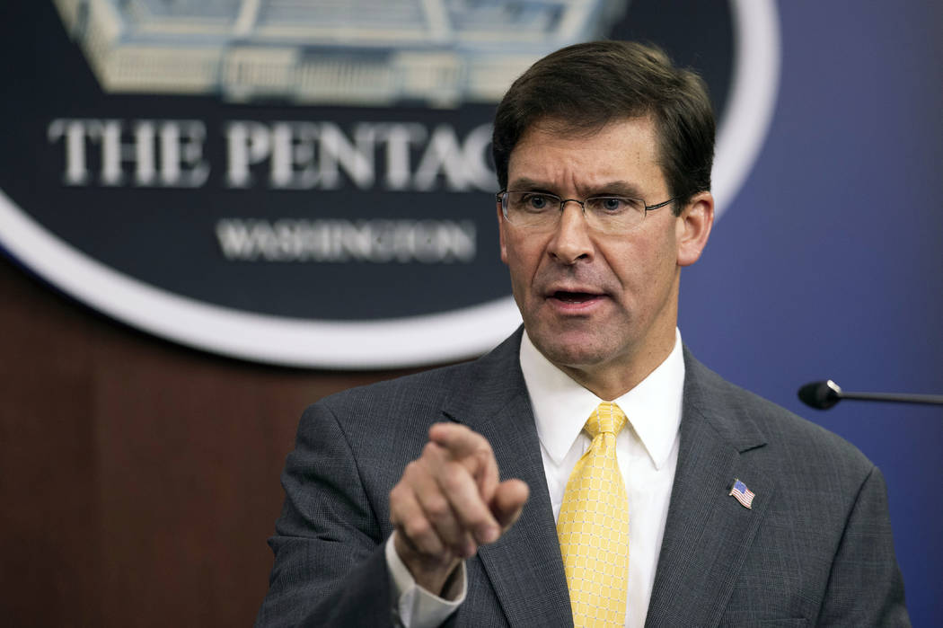 Secretary of Defense Mark Esper speaks to reporters during a briefing at the Pentagon, Wednesda ...