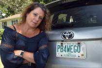 This Aug. 26, 2019 photo shows Wendy Auger standing by her vehicle in Rochester, N.H. The stat ...