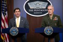 Secretary of Defense Mark Esper and Joint Chiefs Chairman Gen. Joseph Dunford speak to reporter ...