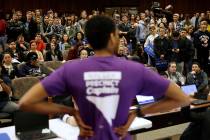 A precinct captain argues his position in February 2016 during a Democratic caucus at the Unive ...