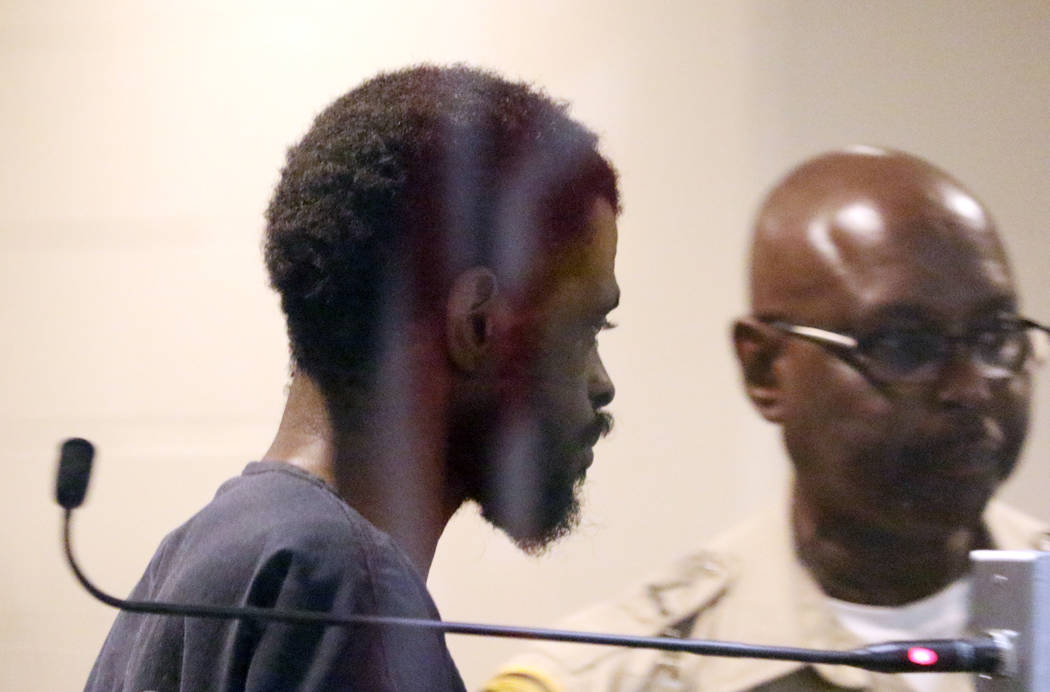 Clinton Taylor, accused of killing a woman with a sledgehammer, is led out of the courtroom aft ...