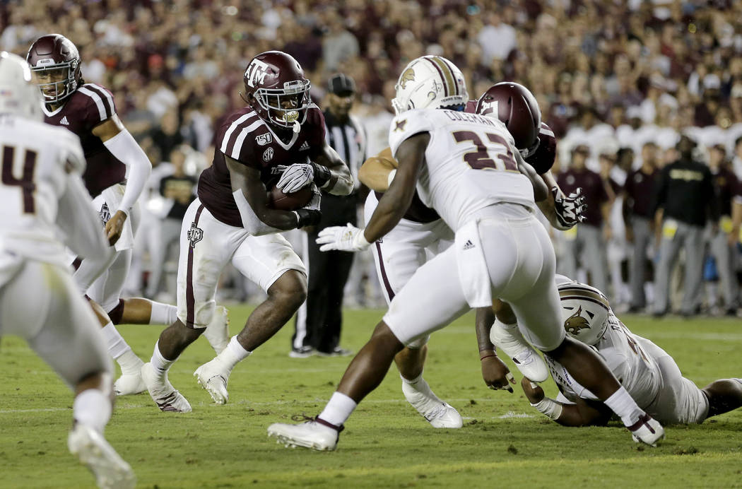 Texas A&M running back Jashaun Corbin (7) rushes for a touchdown against Texas State during ...