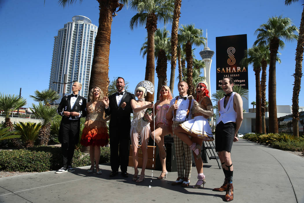 Cast members for Blanc de Blanc participate during the Sahara Las Vegas rebranding event outsid ...