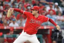 Los Angeles Angels starting pitcher Tyler Skaggs throws to the Oakland Athletics during a baseb ...