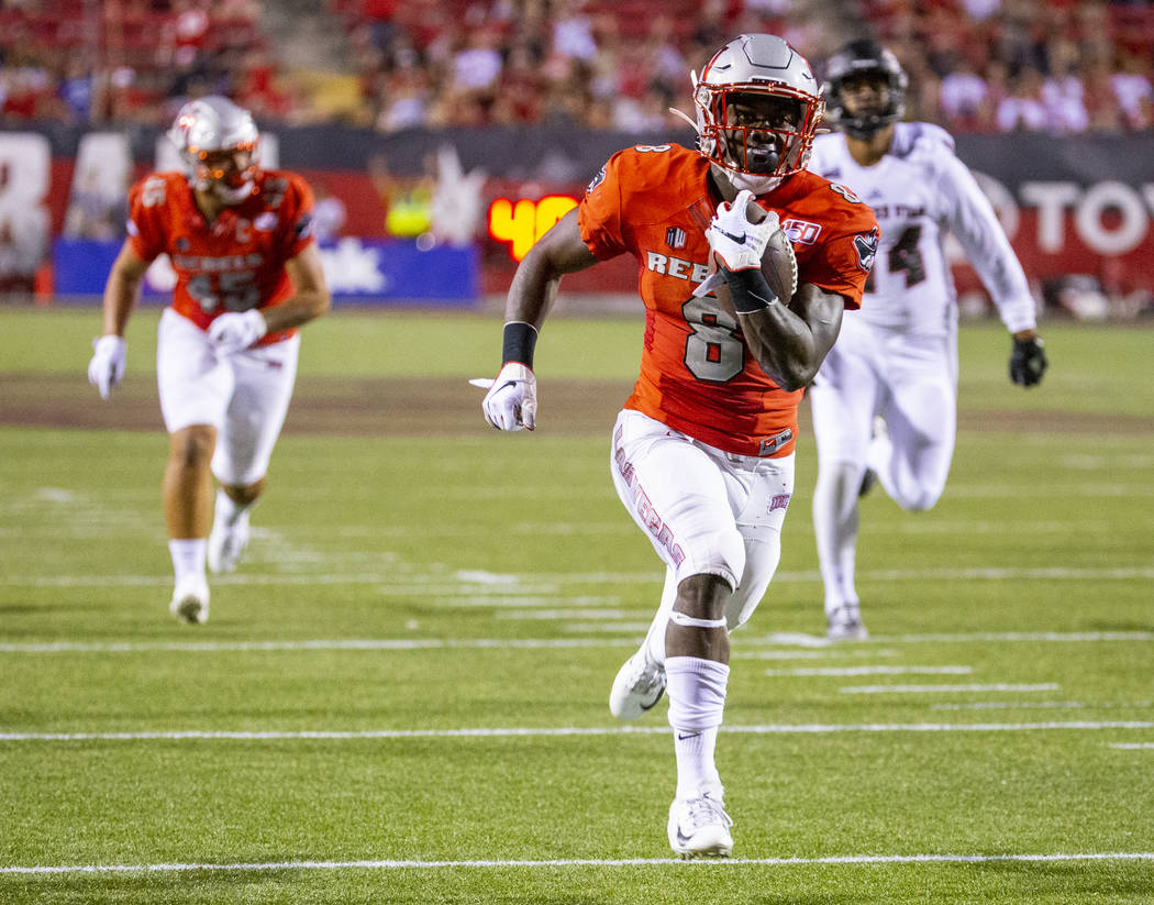 UNLV Rebels running back Charles Williams (8) runs for a touchdown over Southern Utah during th ...