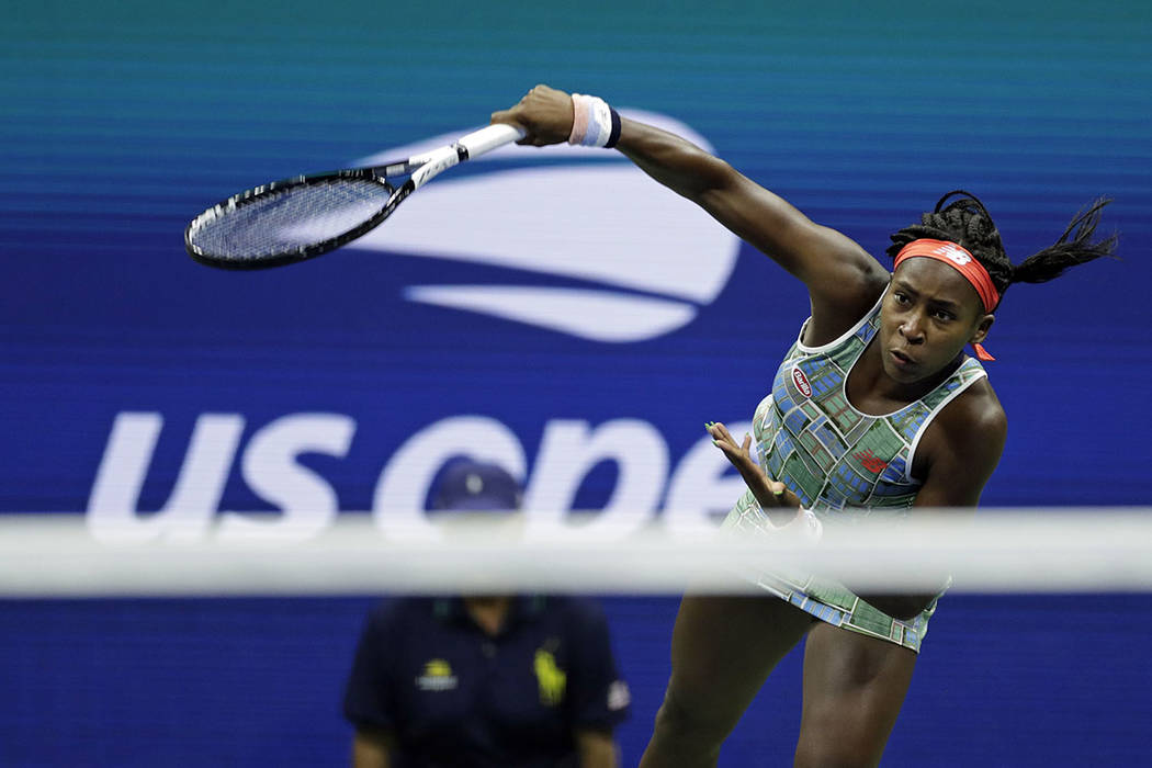 Coco Gauff serves to Naomi Osaka, of Japan, during the third round of the U.S. Open tennis tour ...