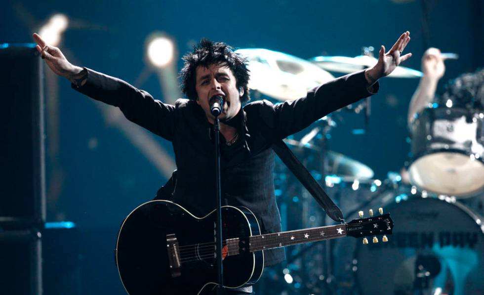 Billie Joe Armstrong, from Green Day, performs at the 37th Annual American Music Awards on Sun ...