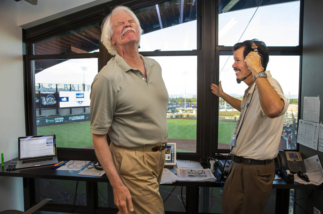 Jerry Reuss, left, and Russ Langer joke around in a fake slap fight before the start of their r ...