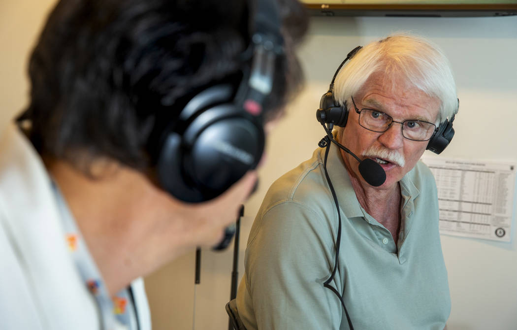 Russ Langer, left, commentates on the play with Jerry Reuss during their radio broadcast for th ...