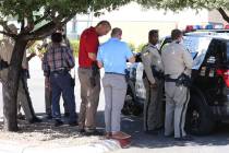 Las Vegas police investigate after a Las Vegas officer shot at a dog after it charged at police ...