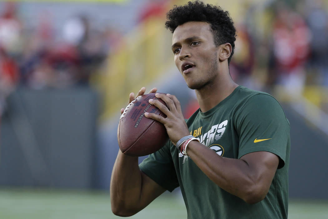 Green Bay Packers' DeShone Kizer warms up before a preseason NFL football game against the Kans ...