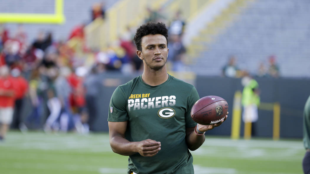 Green Bay Packers' DeShone Kizer warms up before a preseason NFL football game against the Kans ...