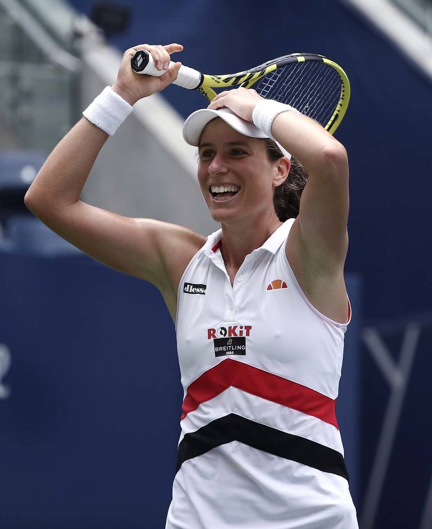 Johanna Konta, of the United Kingdom, reacts after defeating Karolina Pliskova, of the Czech Re ...