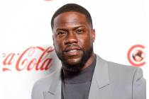In this April 4, 2019 file photo, Kevin Hart poses for photos at the Big Screen Achievement Awa ...