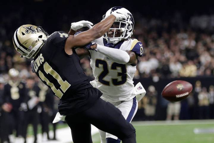 Los Angeles Rams' Nickell Robey-Coleman breaks up a pass intended for New Orleans Saints' Tommy ...