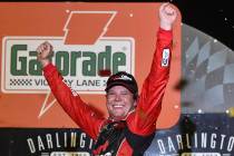 Erik Jones celebrates his victory after a NASCAR Cup Series auto race on Sunday, Sept. 1, 2019, ...