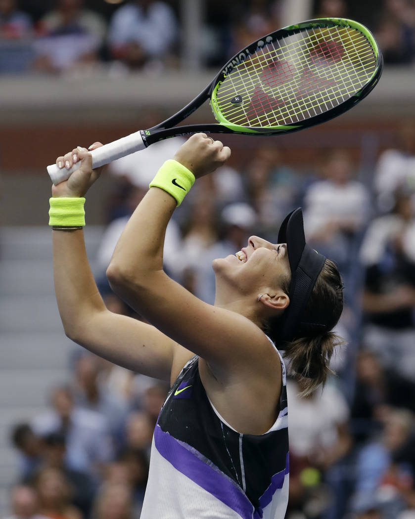 Belinda Bencic, of Switzerland, reacts after defeating Naomi Osaka, of Japan, 7-5, 6-4 during t ...