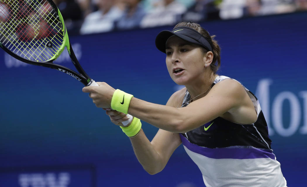 Belinda Bencic, of Switzerland, returns to Naomi Osaka, of Japan, during the fourth round of th ...