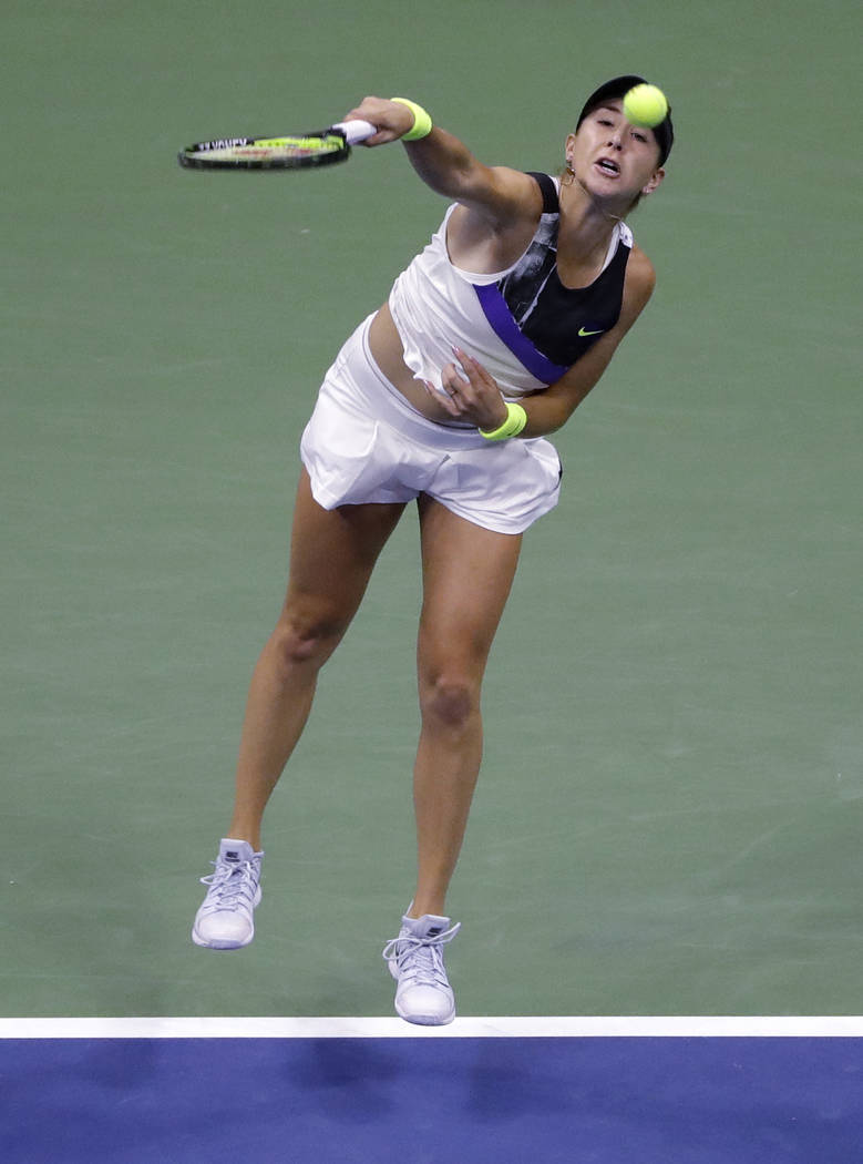 Belinda Bencic, of Switzerland, serves against Naomi Osaka, of Japan, during the fourth round o ...