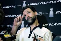 In this Wednesday, May 8, 2019, file photo, Carolina Hurricanes' Justin Williams talks with rep ...