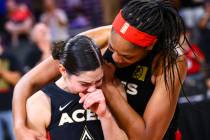 Las Vegas Aces' A'ja Wilson, right, comforts Kelsey Plum after their win against the Los Angele ...