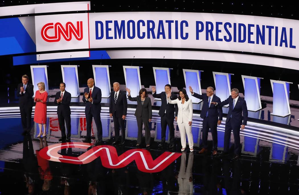 In a July 31, 2019, file photo, Sen. Michael Bennet, D-Colo., Sen. Kirsten Gillibrand, D-N.Y., ...