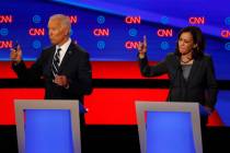 In a July 31, 2019, photo, Sen. Kamala Harris, D-Calif., and former Vice President Joe Biden pa ...