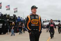 Kurt Busch walks to the garage to start practice for a NASCAR Cup Series auto race at Texas Mot ...