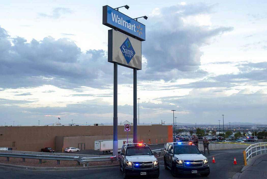 In an Aug. 3, 2019, photo Texas state police cars block the access to the Walmart store in the ...