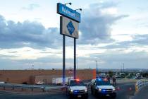 In an Aug. 3, 2019, photo Texas state police cars block the access to the Walmart store in the ...