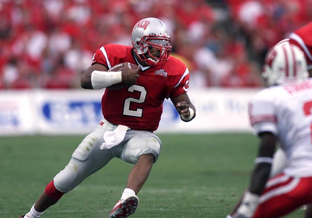 UNLV quarterback Jason Thomas scrambles in the first quarter against Wisconsin Saturday, Aug. 3 ...