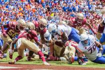 Boise State Broncos running back Robert Mahone (34) dives for the end zone in the 1st half of a ...