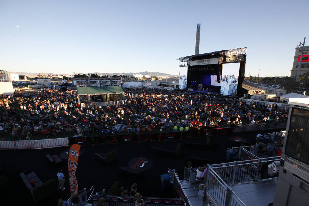 Fans listen to Dustin Lynch perform at the Route 91 Harvest country music festival at the MGM R ...