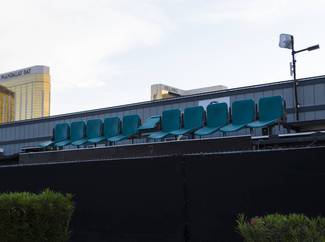 Chairs sit by a fence at the former Route 91 Harvest music festival site in Las Vegas on Tuesda ...