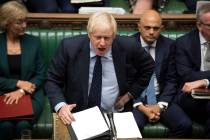 In this image released by the House of Commons, Britain's Prime Minister Boris Johnson speaks i ...