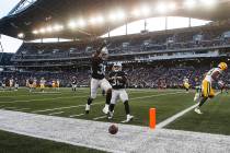 Oakland Raiders' Keisean Nixon (38) celebrates after knocking away a pass in the end zone inten ...