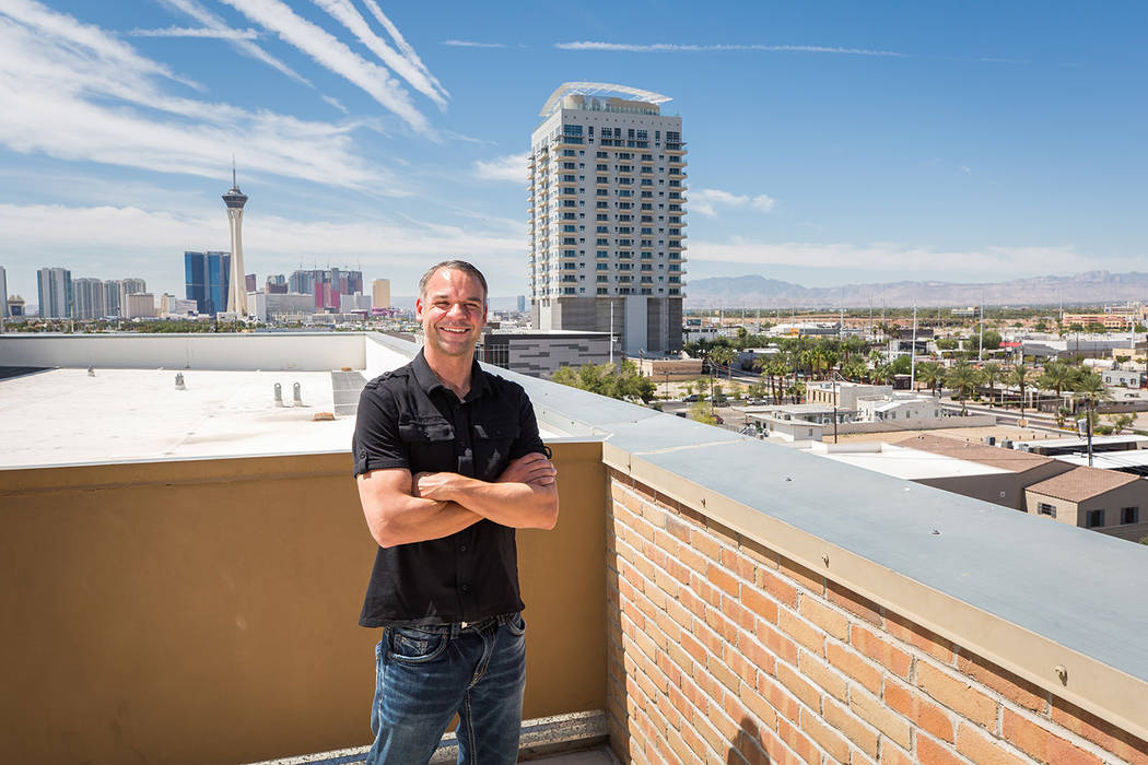 Joe Van Dusen, a commercial airline pilot, enjoys the view from his balcony at Juhl, a loft-sty ...