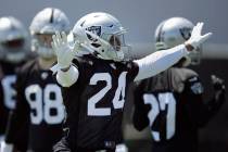 Oakland Raiders safety Johnathan Abram (24) gestures during an NFL football practice on Friday, ...