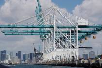 In a July 24, 2019, photo, large cranes to unload container ships are shown at PortMiami in Mia ...