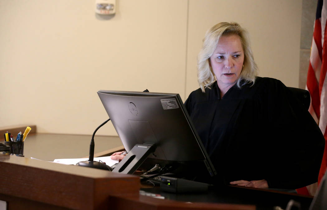 Las Vegas Justice of the Peace Ann Zimmerman presides as Chuck Chaiyakul, 38, suspected in the ...