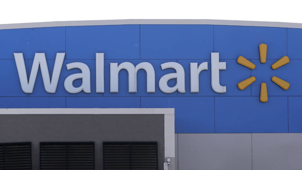 A Walmart logo is attached to the outside of a Walmart store, Tuesday, Sept. 3, 2019, in Walpol ...