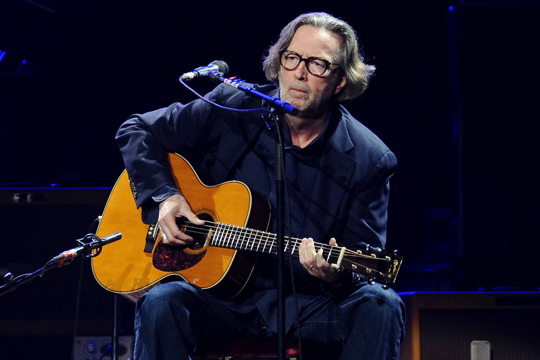 FILE - In this Feb. 18, 2010 file photo, Eric Clapton performs in concert at Madison Square Gar ...