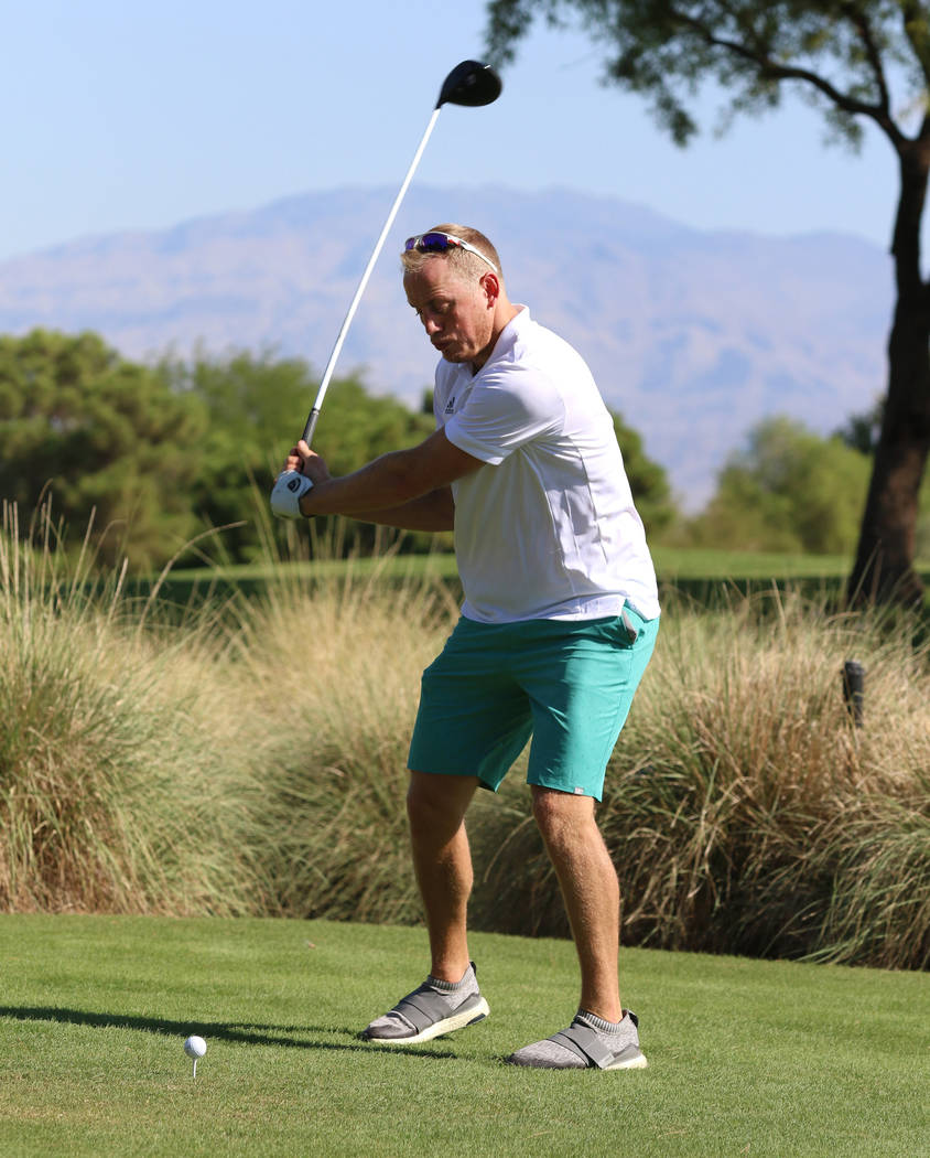 Golden Knights Nate Schmidt hits his drive during the Golden Knights charity golf tournament at ...