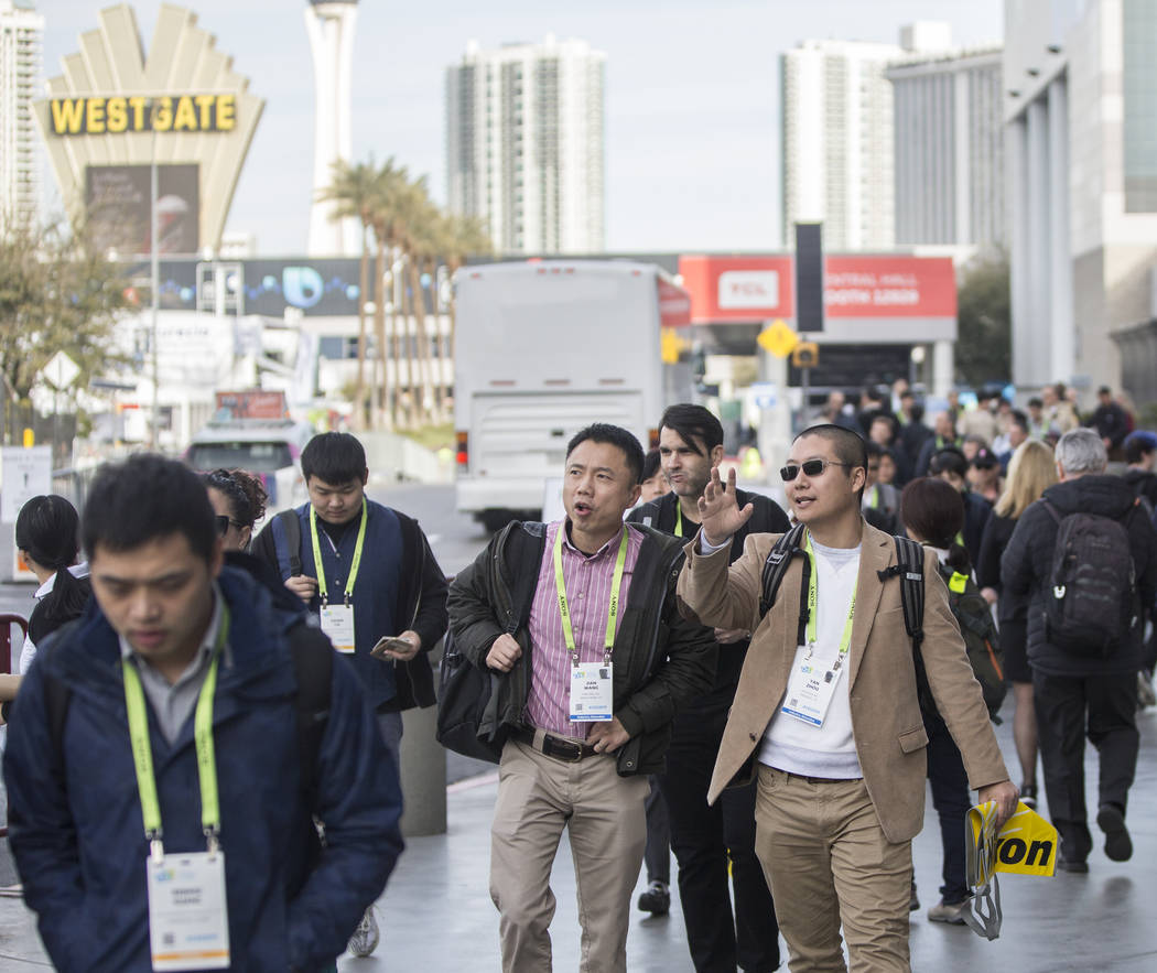 The sidewalks outside the Las Vegas Convention Center are packed during the last day of CES 201 ...
