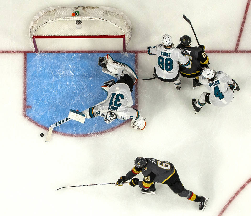 San Jose Sharks goaltender Martin Jones (31) reaches out to stop a shot on goal by Golden Knigh ...